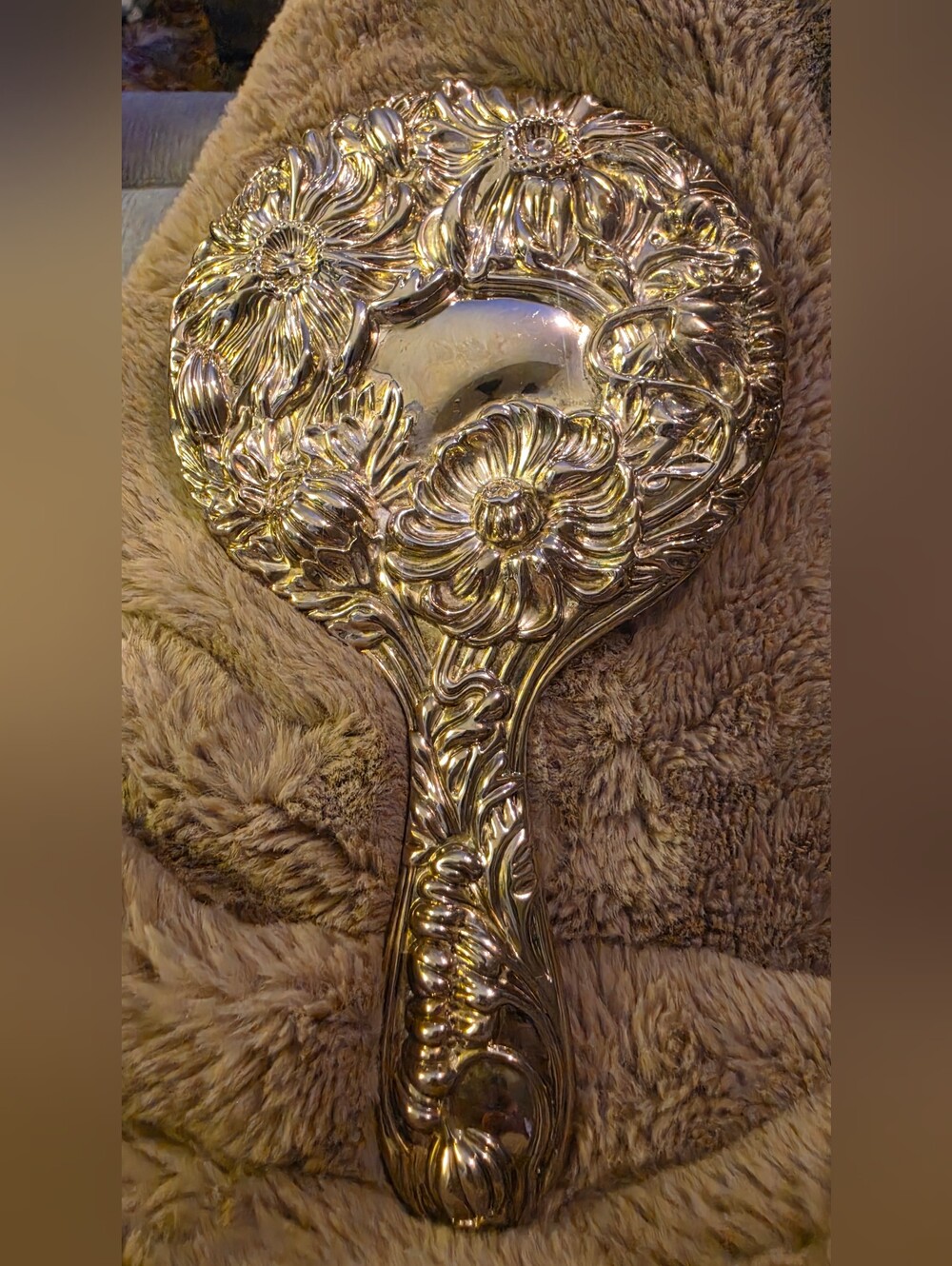 Vintage Silver-plated Handheld Vanity Mirror is a charming collectible